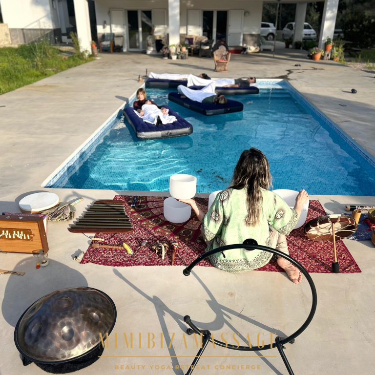 floating sound healing session in Ibiza pool with crystal bowls